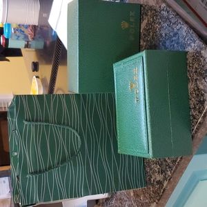Rolex box, case, and shopping bag